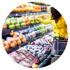 Shopper in produce section of a grocery store
